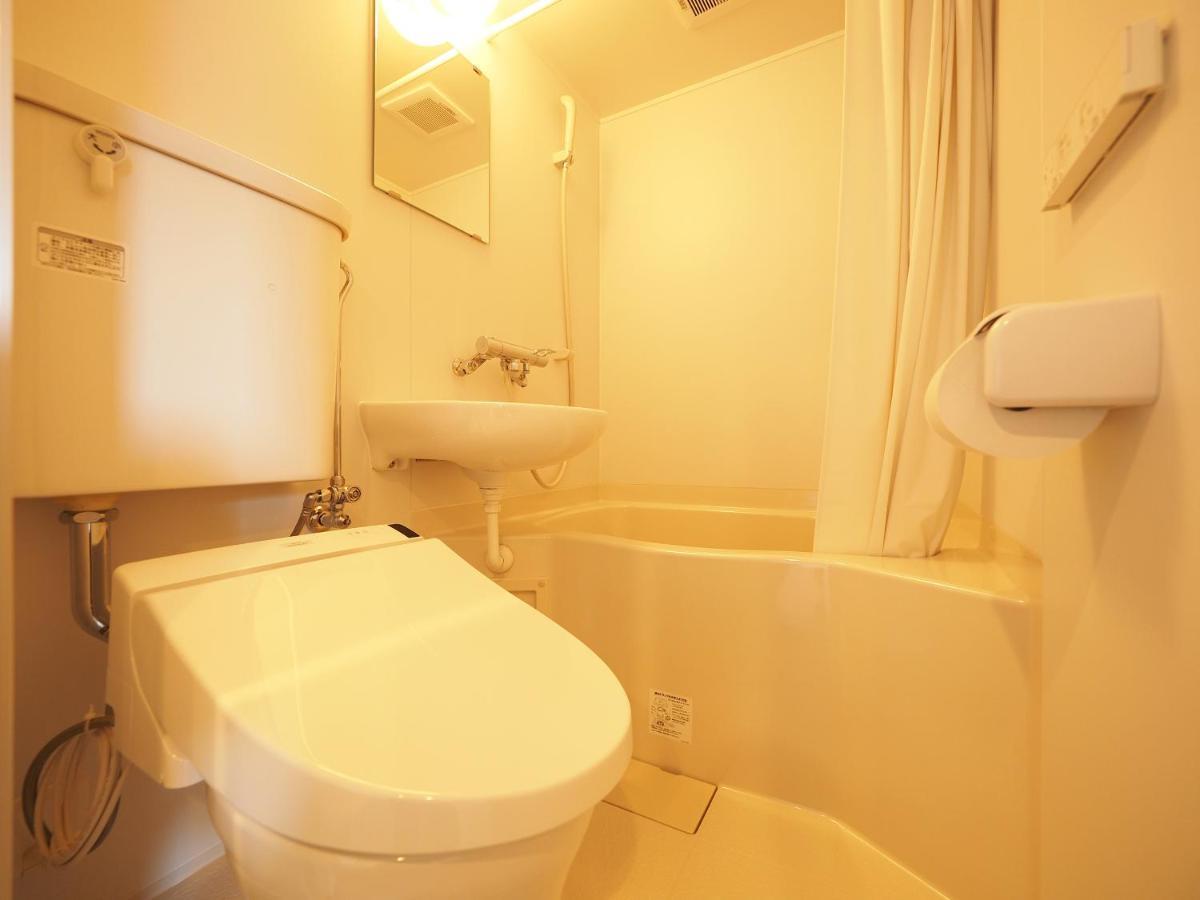 Family Tree Guest House Sapporo Exterior foto